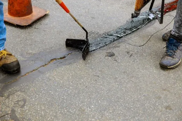 Pothole repair, asphalt patching, and crack sealing in St. George for driveways, parking lot aisles, and private lanes not ready for full replacement.